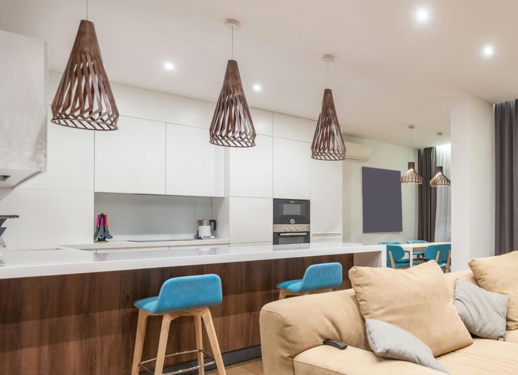 Modern kitchen lighting with LED downlights creating a warm illuminated residential interior